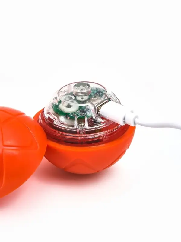 Интерактивная игрушка для собак "Гравитационный мяч", 5,5 см, оранжевая