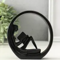 Сувенир полистоун "Девушка читает книгу" чёрный 4х11,3х11,7 см