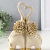 Сувенир полистоун " Парочка слонов с цветочными ушами" песочный 8х17х25,5 см