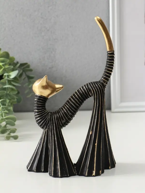 Сувенир полистоун "Кошка в клёшах" чёрно-золотая 7,5х15х25 см