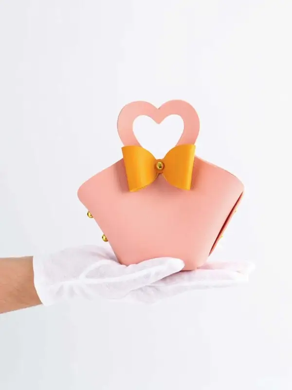 Кожанная подарочная сумочка 10,5 х 5 х 6 см розовая