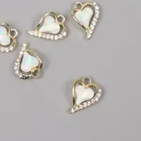 Декор для творчества металл, стразы "Изогнутое сердце" золото, белый 1,8х1,3х0,5 см