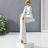 Сувенир полистоун "Стильная девушка на стуле" белый с золотом 7,5х10,5х29,5 см