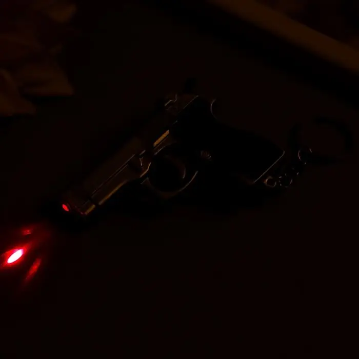 Фонарик свет+лазер на кольце "Пистолет" 2 режима  7х5х1,7 см