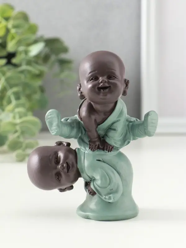 Сувенир полистоун "Маленькие будды - игра в чехарду" зелёно-коричневый 4,7х9,3х11 см