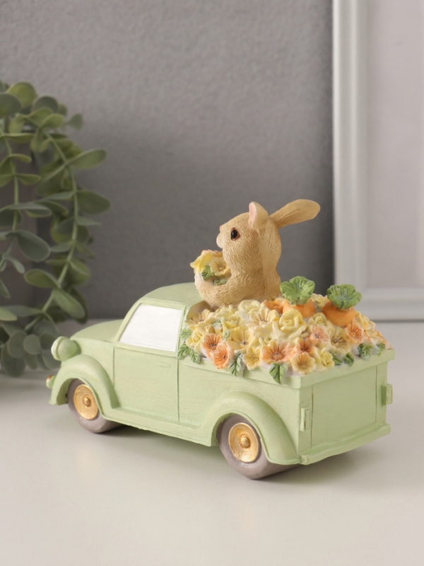 Сувенир полистоун "Зайчики в грузовике с цветами и морковью в кузове" 16х7,5х11,5 см