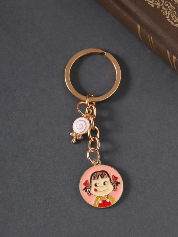 Брелок металл, эмаль "Девочка и леденец" 9 см