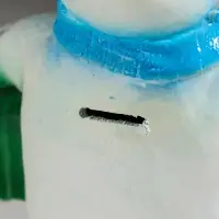 Фигура "Снеговик с подарком" 19 см, голубой