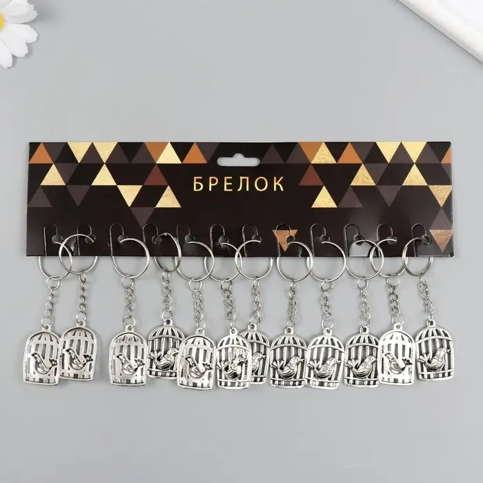 Брелок металл "Птица у клетки" серебро 2,2х3,6 см