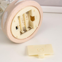 Сувенир полистоун свет "Ангел-девочка с двумя шишечками, в колбе" МИКС 15,7х9,5х9,5 см