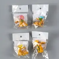 Сувенир полистоун "Заяц с яркой ромашкой" МИКС 2,5х3,8х4,4 см