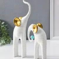Сувенир полистоун "Слоны. Гофре" белый с золотом набор 2 шт 5х10х16,5 5,5х16,5х29,5 см