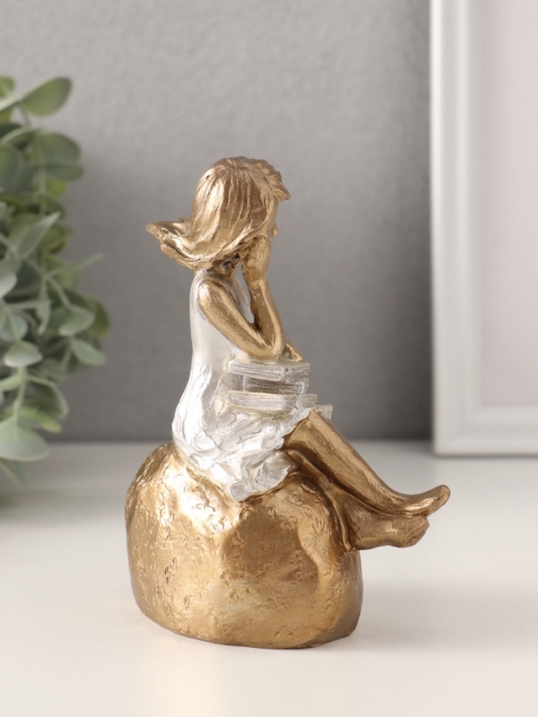 Сувенир полистоун "Малышка с книгами на камне" бронза с серебром 9х5,5х12,5 см