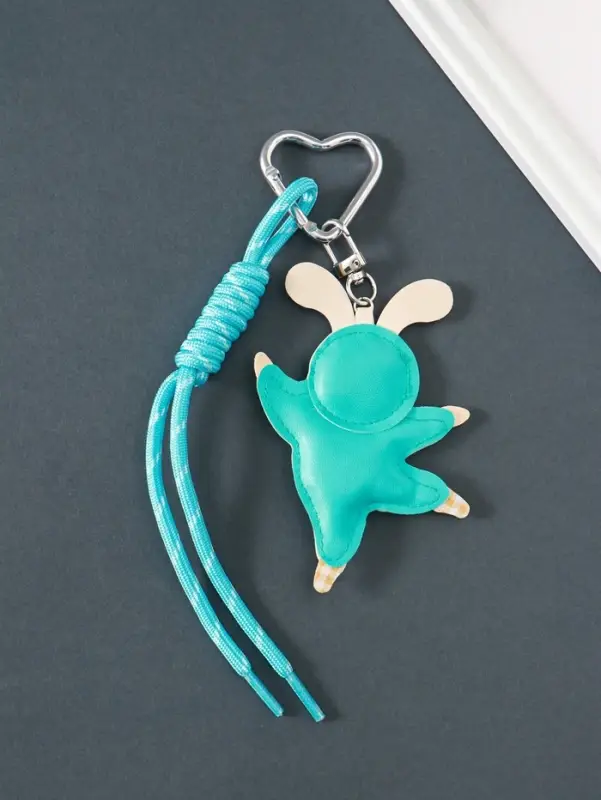 Брелок на карабине кожзам, текстиль "Танцующий зайчик" с узлом, голубой 24х7,5х1 см