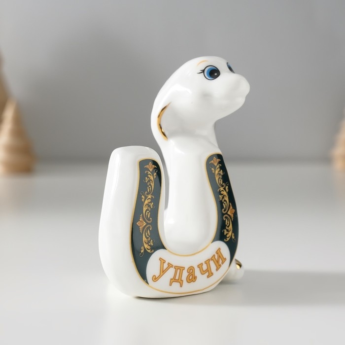 Сувенир керамика "Зелёная кобра в новогоднем колпаке" 4х6х8 см