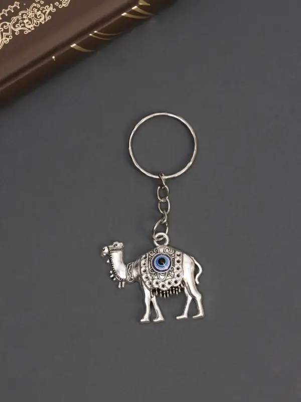 Брелок металл глазки "Верблюд" 3х3 см