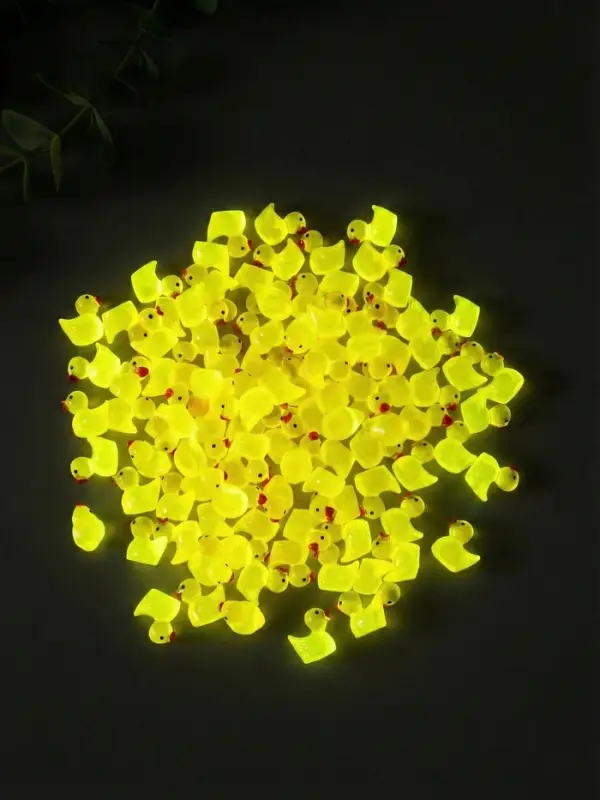 Сувенир полистоун флюоресцентный "Уточки" набор 100 шт 1,5х1,5 см