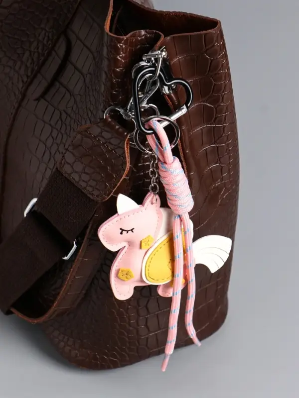 Брелок на карабине кожзам, текстиль "Единорог с крыльями" розовый, с узлом 24х10,5х1,5 см