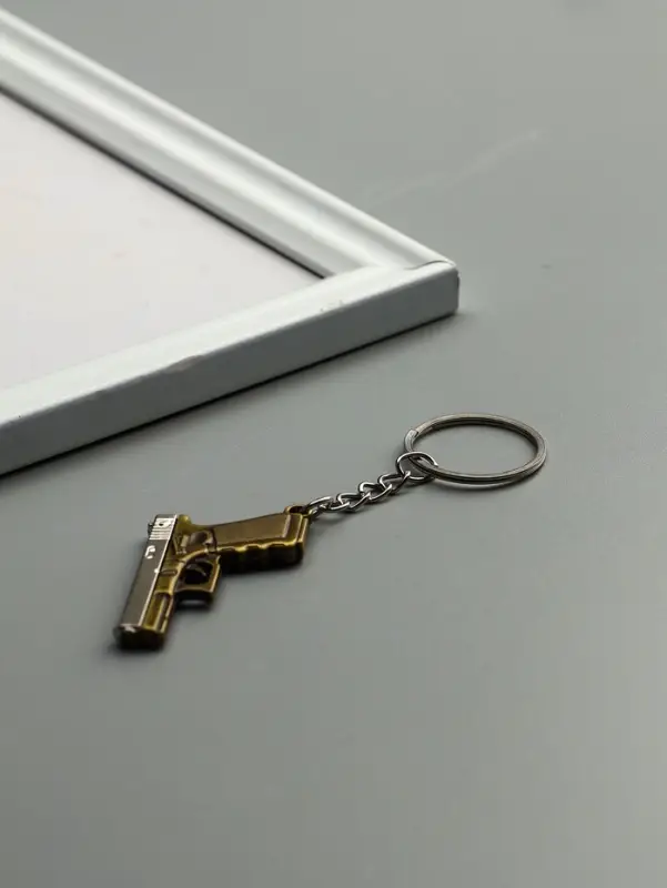 Брелок металл "Пистолет" двигается затвор МИКС 3х4,3х0,5 см
