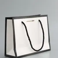 Пакет подарочный, белый, с бантом, 19 х 15 х 7 см