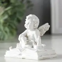 Сувенир полистоун "Ангелок с лупой на книге" белый 7,7х5х7 см
