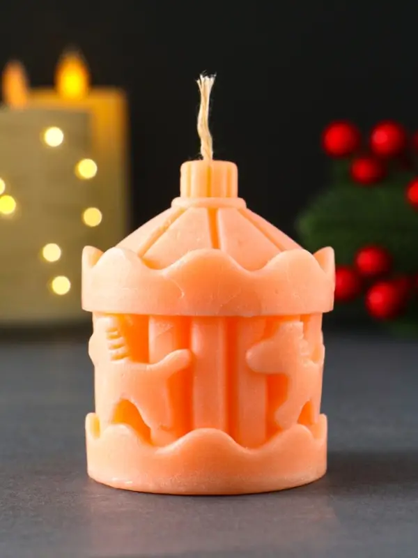 Свеча новогодняя "Карусель с лошадками" 60х80 мм, персиковый