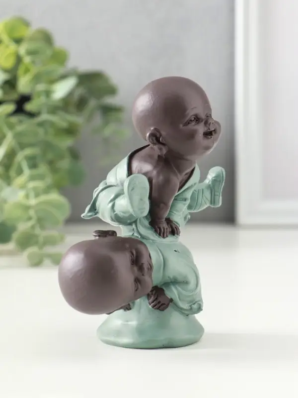 Сувенир полистоун "Маленькие будды - игра в чехарду" зелёно-коричневый 4,7х9,3х11 см