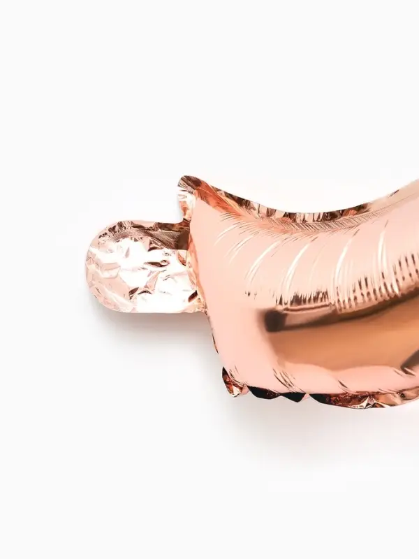 Воздушный шар фольгированный 22" "Бант" цвет розовое-золото