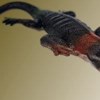 Антистресс игрушка ящерица темная