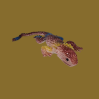 Антистресс игрушка ящерица золотистая