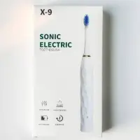 Электрическая зубная щётка X-9 белая