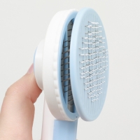 Пуходёрка пластиковая с функцией самоочистки, 7,7 х 19,1 см, голубая