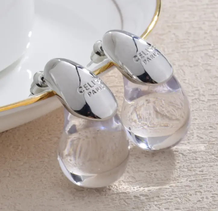 Серьги пусеты Капли прозрачные серебристые