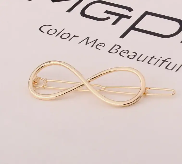 Заколка для волос Бесконечность золотая