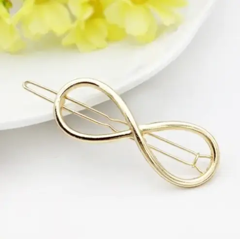 Заколка для волос Бесконечность золотая